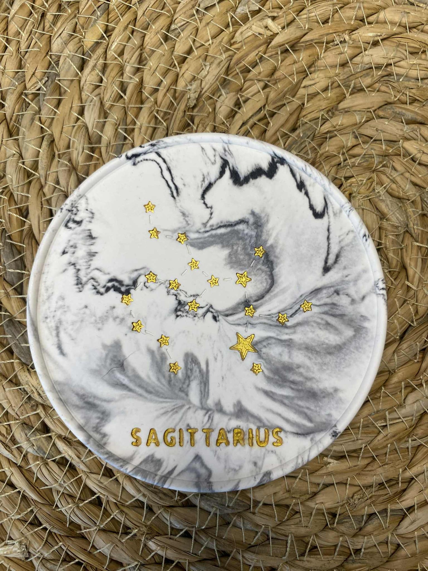 Padėkliukas su Šaulio žvaigždynu